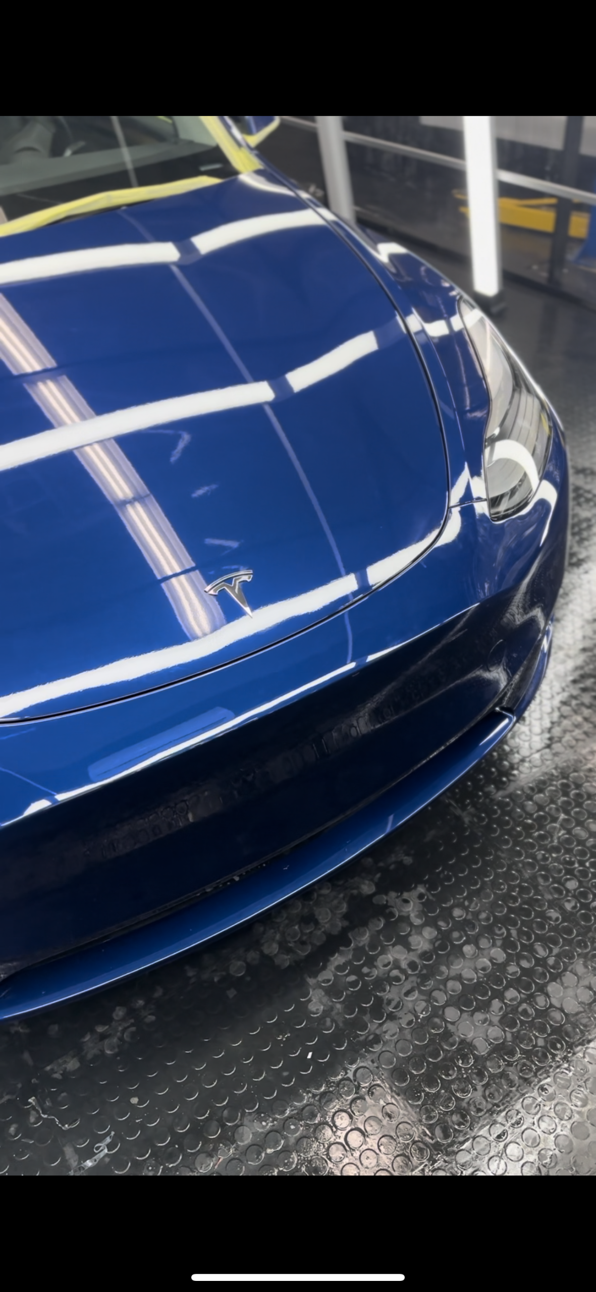 Blue tesla with ppf front view